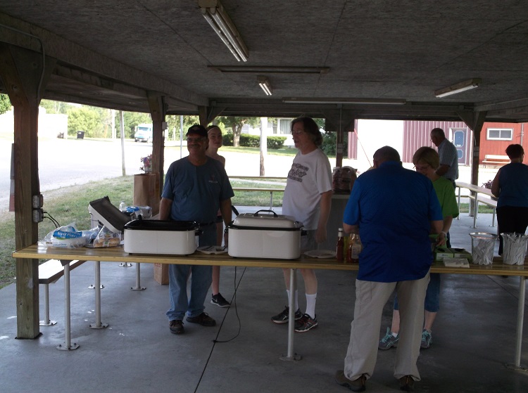 The Minburn United Methodist Church served up beef burgers and hot dogs at the first Meet Me in Minburn event for 2016. Photo courtesy Doug Wood