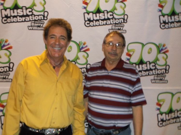 My friend Dan Haymond and I bought studio-quality pictures of ourselves with former "Brady Bunch" star Barry Williams, who signed our pictures.