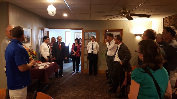 About a dozen friends and admirers of Iowa Gov. Terry E. Branstad were on hand Wednesday afternoon for a light lunch with the governor in the recently reopened Tic Toc Italian Trattoria in Boone.