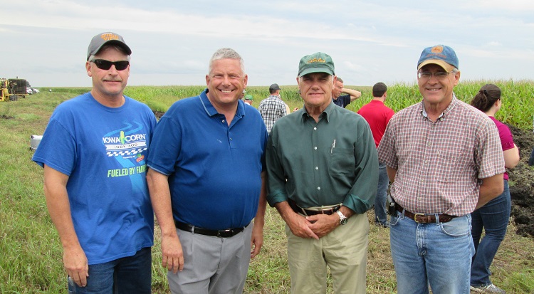 Touring the grounds of the saturated buffer strip near Perry Friday were, from left, Dallas County Supervisor Brad Golightly, Iowa Department of Agriculture and Land Stewardship Secretary Bill Northey and Dallas County Soil and Water District Commissioners Ray Harden and Sam Spellman.