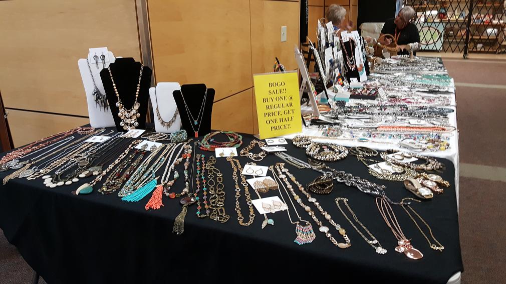 Cheri Delay of Premier Designs' extensive selection of jewelry was "packed up before you know it" Wednesday at the DCH Foundation fundraiser.