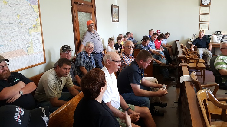 About 25 people attended a public hearing Monday morning at the Greene County Board of Supervisors meeting. They spoke for and against a new 5,000-head hog confinement proposed for Bristol Township.