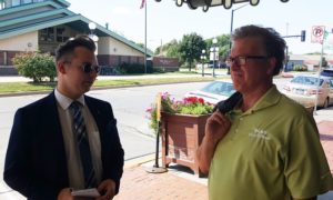 Metro media personage Ben Oldach, left, interviewed Perry Mayor Jay Pattee Tuesday before the Perry City Council approved the urban revitalization plan.