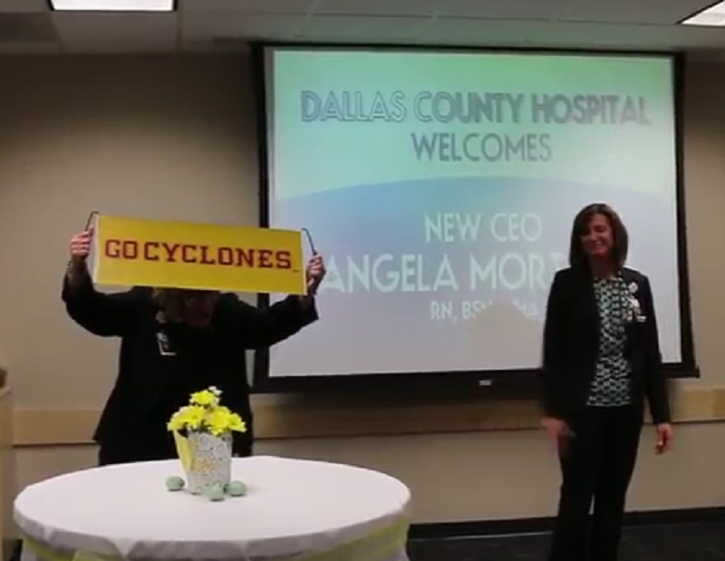 A zealous Iowa State Cyclone fan, Vandehaar, left, displayed the cardinal and gold colors proudly March 17 at the reception for incoming DCH CEO Angela Mortoza, right.