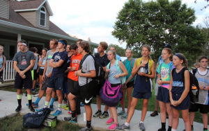 A pile of Panthers listen to announcements at the conclusion of Thursday's meet in Audubon. Photo courtesy Eileen Nordquist.