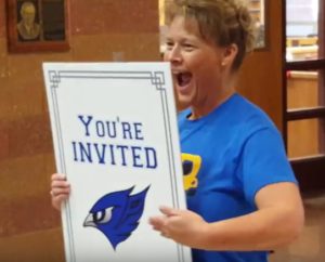 Longstanding Perry-Area Chamber of Commerce Board of Directors member Misty Von Behren read the official invitation to the 2016 PHS Homecoming Parade Friday.