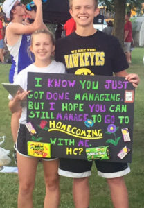 She said yes. Junior Aaron Lockwood came up with this way of inviting Star Love (left) to attend Homecoming as his date. The dance will follow Perry's Sept. 30 game with Gilbert. Photo courtesy Jeff Fox.
