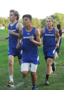 Zach Stewart (left), Mario Cruz and Dane McCarty ran in a pack for the Bluejays in Tuesday's Newton Invitational. Photo courtesy Mark McCarty.