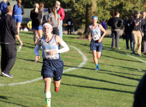 Panorama's Danny Nordquist leads teammate Mitch Wagler along the course Thursday in the WCC conference meet. Photo courtesy Eileen Nordquist.