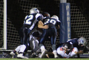 Panorama's Jeramy Randol (72) helps Brody Richheim bull into the end zone for a touchdown during Friday's Homecoming game with NW Webster.
