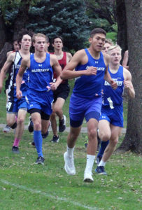 From left: Dane McCarty, Alexis Macias and Zach Thompson run for Perry in the RRC meet Oct. 10.