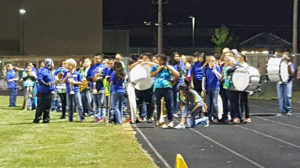 The Perry Middle School band waits to join the PHS Blue Brigade on the field at halftime on the season finale Oct. 21.