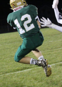 W-G wideout John Stucker makes a leaping catch in the first quarter.
