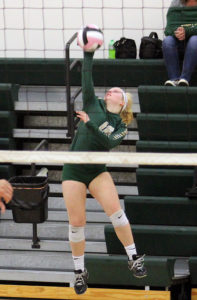 W-G libero Kara Bodensteiner serves against South Hardin Saturday at the Norm McCune Invite. She finished a combined 41-of-43 with four aces from behind the line.