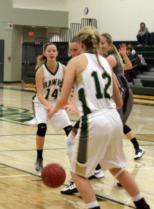 Kayley Dresback (14) makes an entry pass to Mary Hansen (12) against CMB Nov. 21.