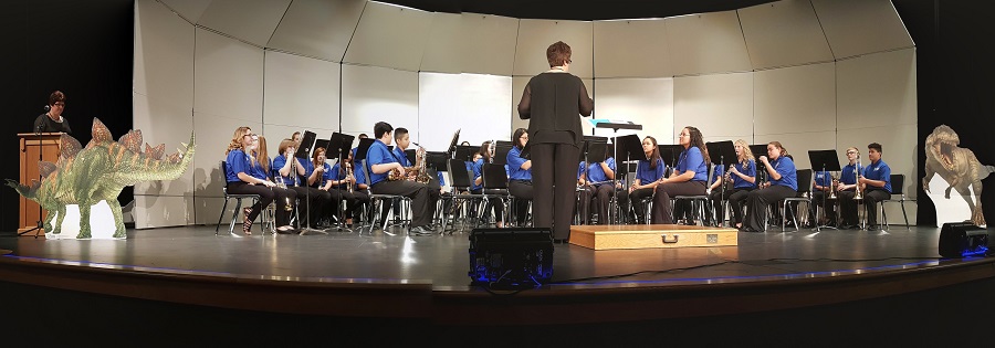 Dinosaurs ruled the stage when the Perry Middle School eighth grade band played Carmine Pastore's "When the Dinosaurs Ruled the World" at Monday's Perry Middle School Band and Choir Winter Concert.