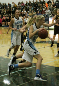 Morgan Johnk takes the ball to the basket.