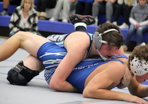Panorama's Noah Kirtley attempts to turn his opponent during their match at 145 pounds Dec. 9 at the Central Decatur Invite. Photo courtesy Eileen Nordquist.