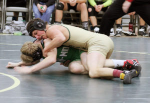 W-G's Cole Carmen works for an advantage during his match at 138 pounds during the Dennis Field Duals Dec. 3.
