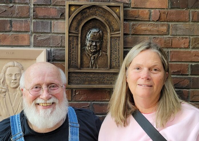 rick and elizabeth with bas relief